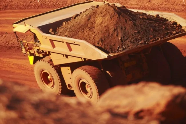 BHP posts five-year low profit on weaker iron ore prices