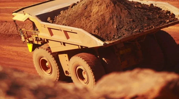 BHP posts five-year low profit on weaker iron ore prices