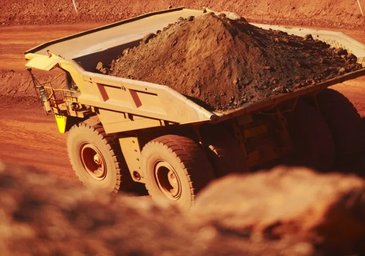 BHP posts five-year low profit on weaker iron ore prices